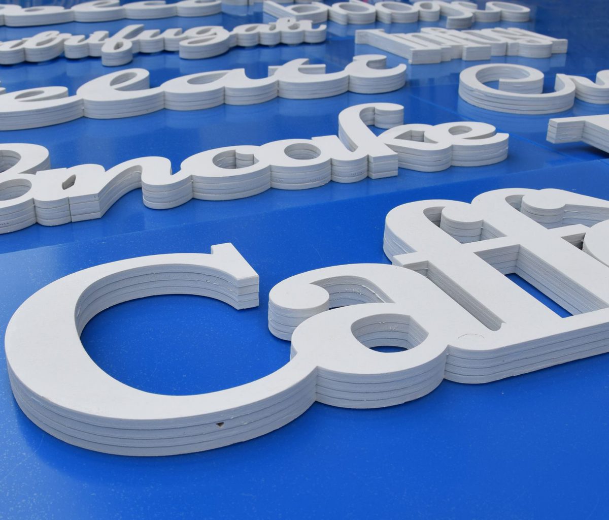 Signboards in laminated and varnished wood