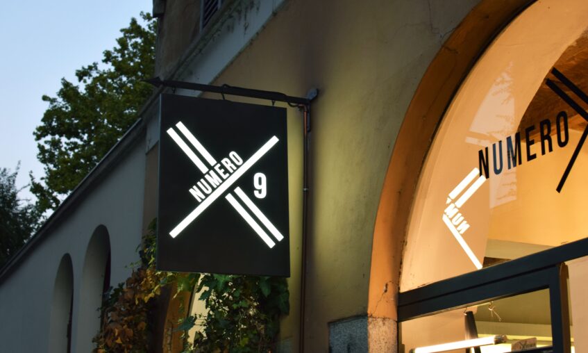 Black iron laser-cut sign and LED